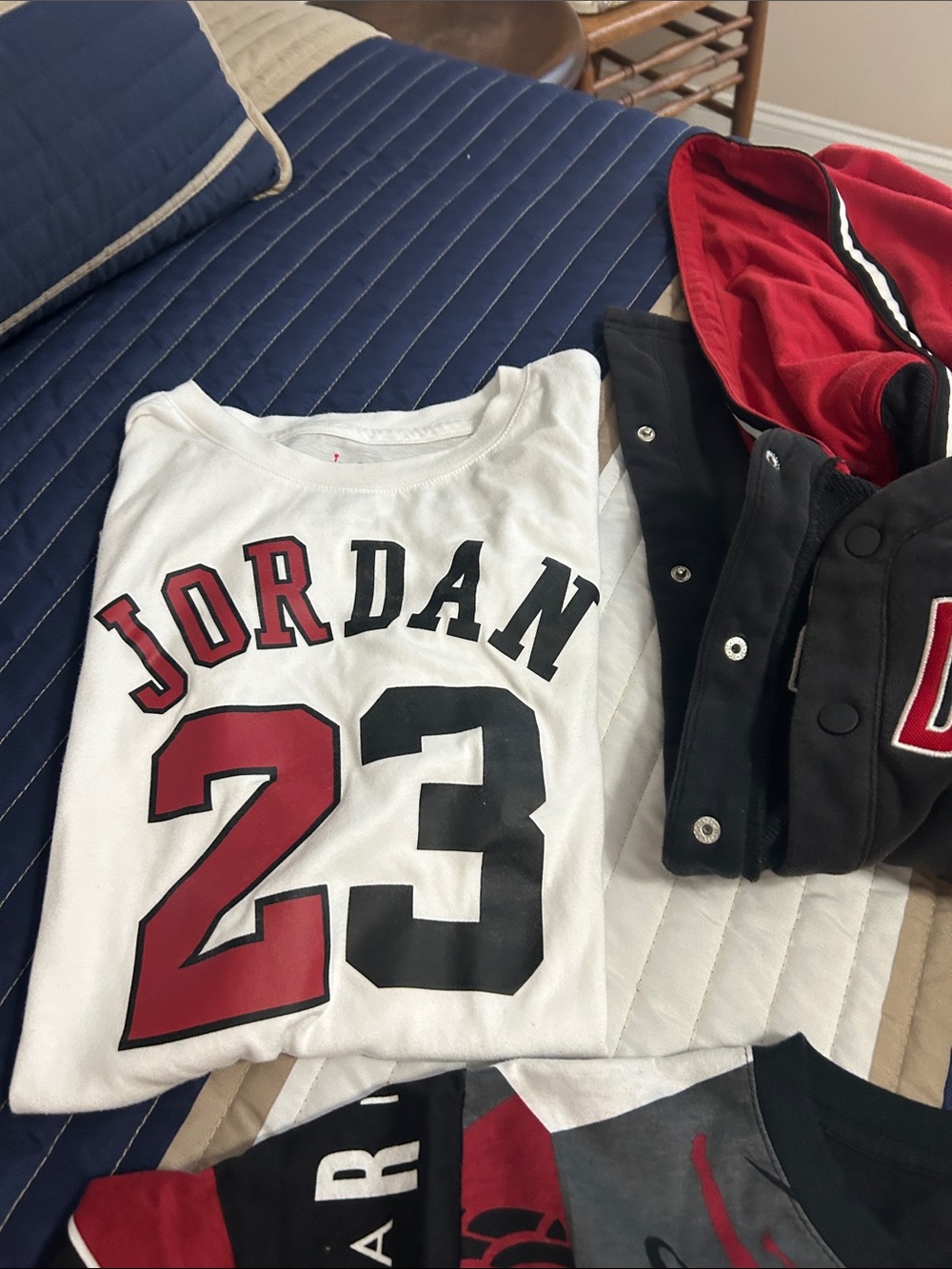 Lot of Air Jordan tees, Jordan hoodie with Addias joggers.